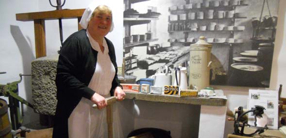 Eleanor Scarr volunteering in Dales Countryside Museum's Victorian kitchen